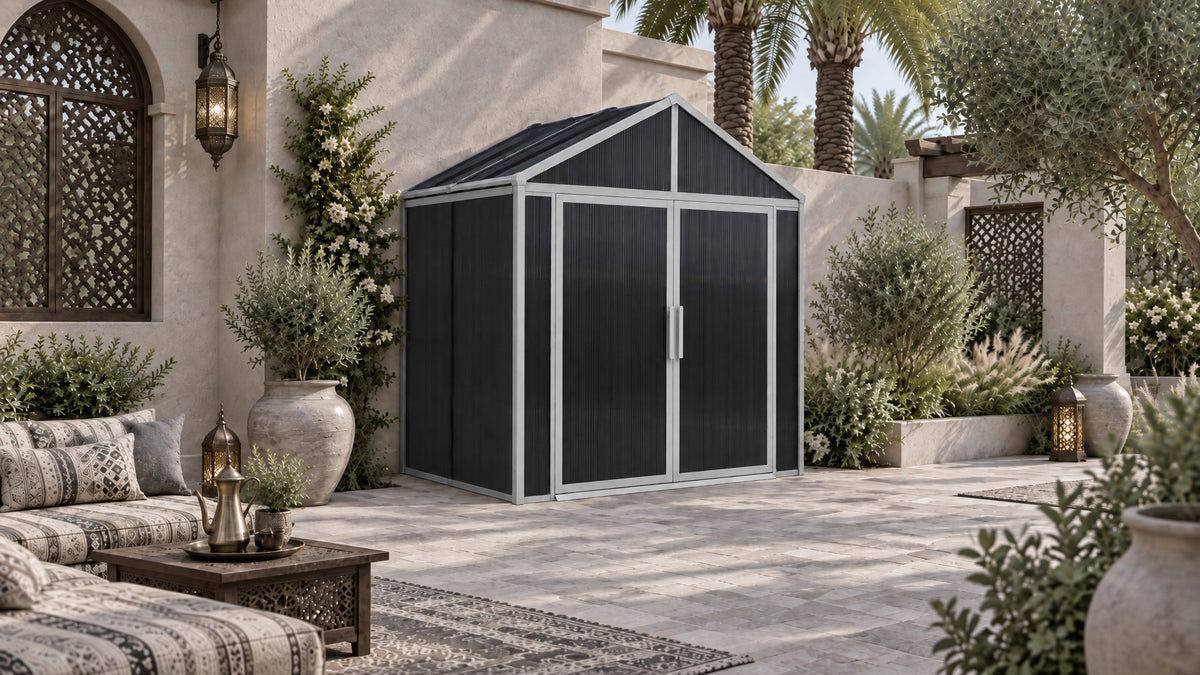 DOMER Smart Slate Shed with grey profiles in a courtyard #Profile colour_Grey
