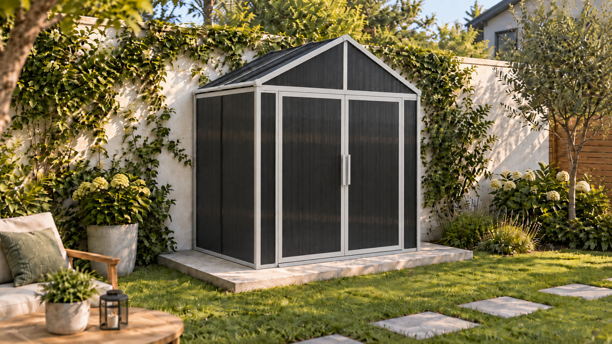 DOMER Smart Slate Shed with grey profiles in a green garden #Profile colour_Grey